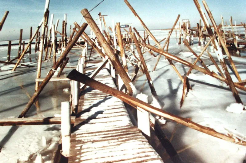 boat dock covered in ice and snow